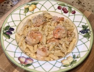 Shrimp and penne pasta in a creamy garlic sauce by Little Gray Squirrel
