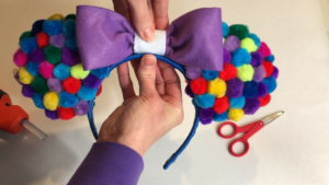 Test fit and glue bow DIY Balloon Ears Tutorial by Little Gray Squirrel