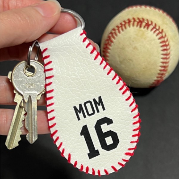 Finished baseball keychain that looks like it was made from a real baseball