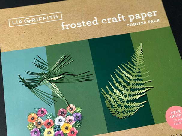 Pine needles and fern leaf cut perfectly out of Lia Griffith Frosted craft paper