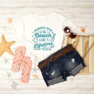 A flatlay image with shorts, beach accessories, and a wood background, t shirt with a digital cut file placed on top to show an example of a mockup made using Silhouette Studio