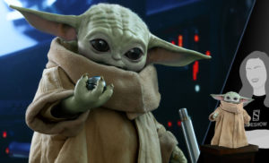Baby Yoda life like figure holding a shift knob